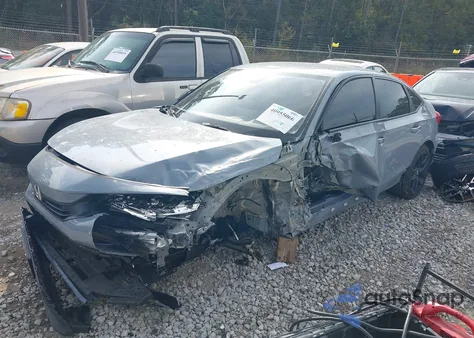 2023 Honda Civic Sport z USA, uszkodzony, nr VIN 2HGFE2F59PH570256